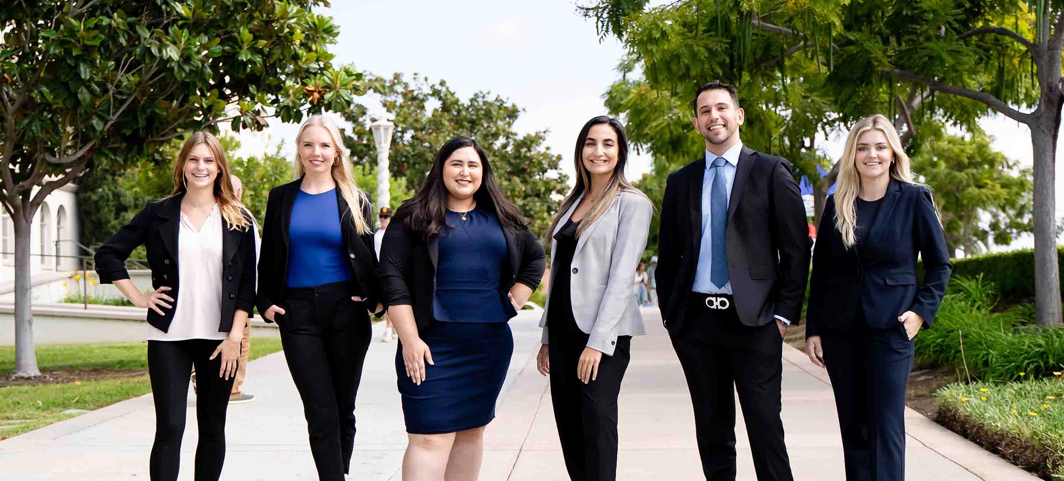 Students from externships posing in a group