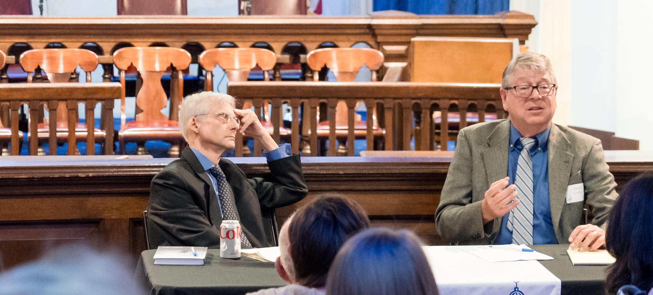 Faculty members in a meeting