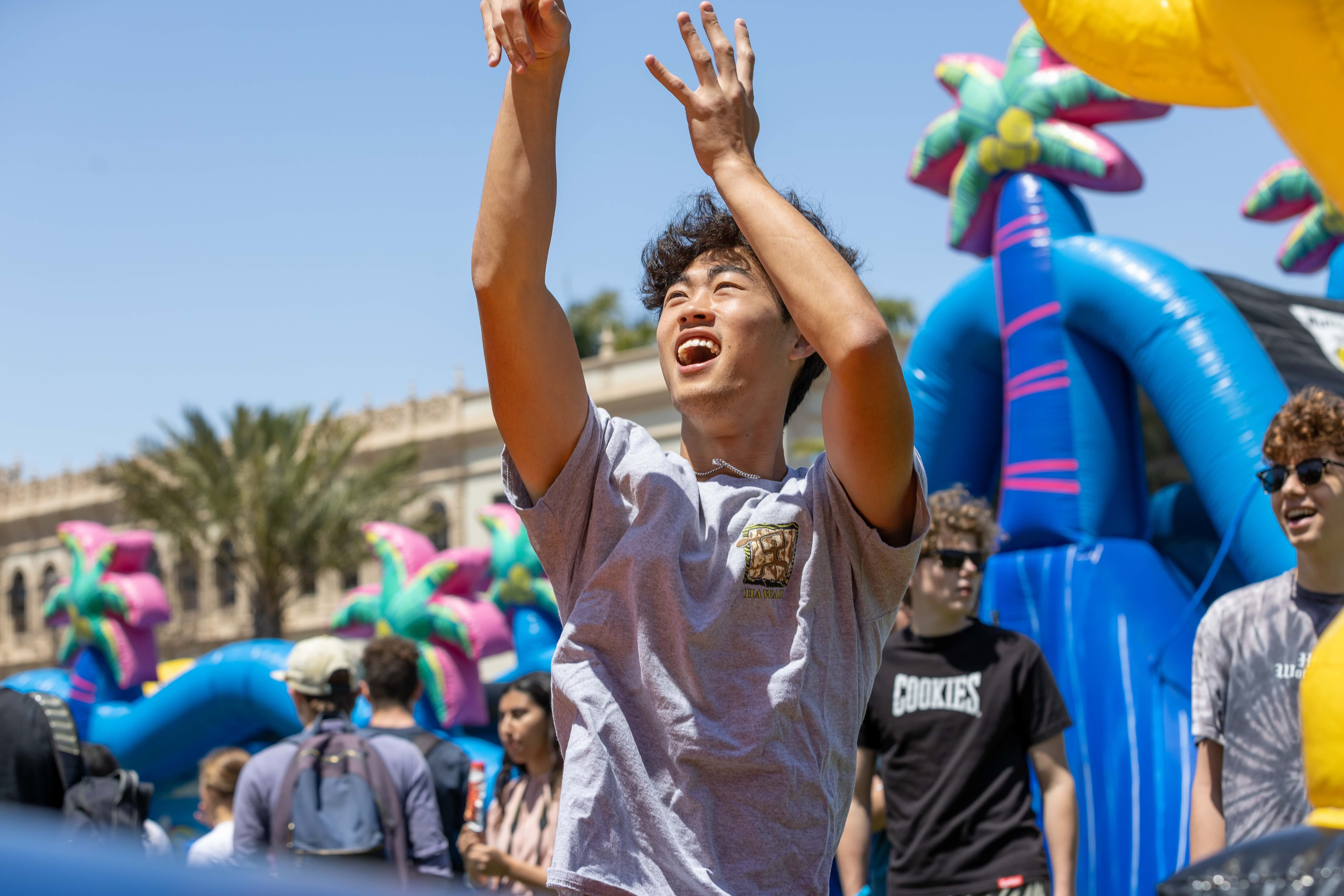 Student throwing a basket ball