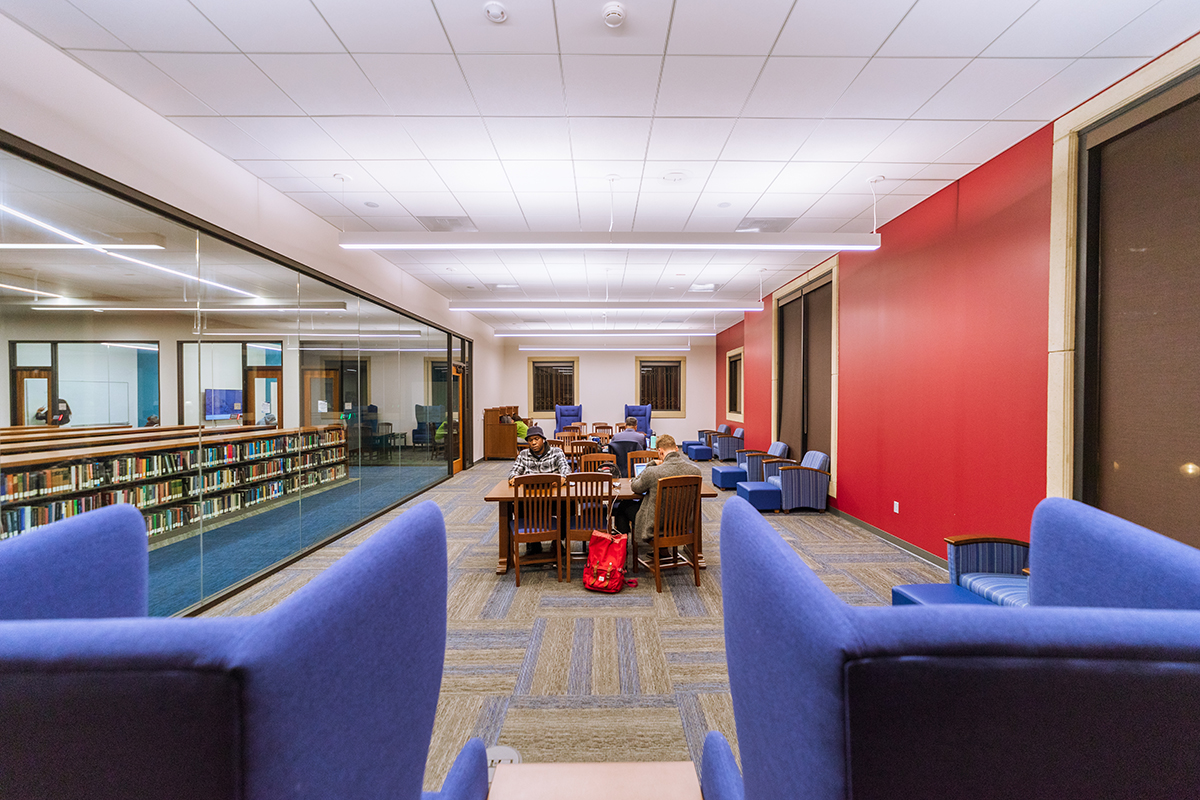 image of students reading in lounge area