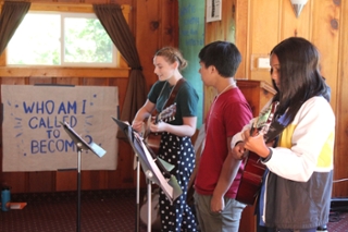 students performing at first year retreat