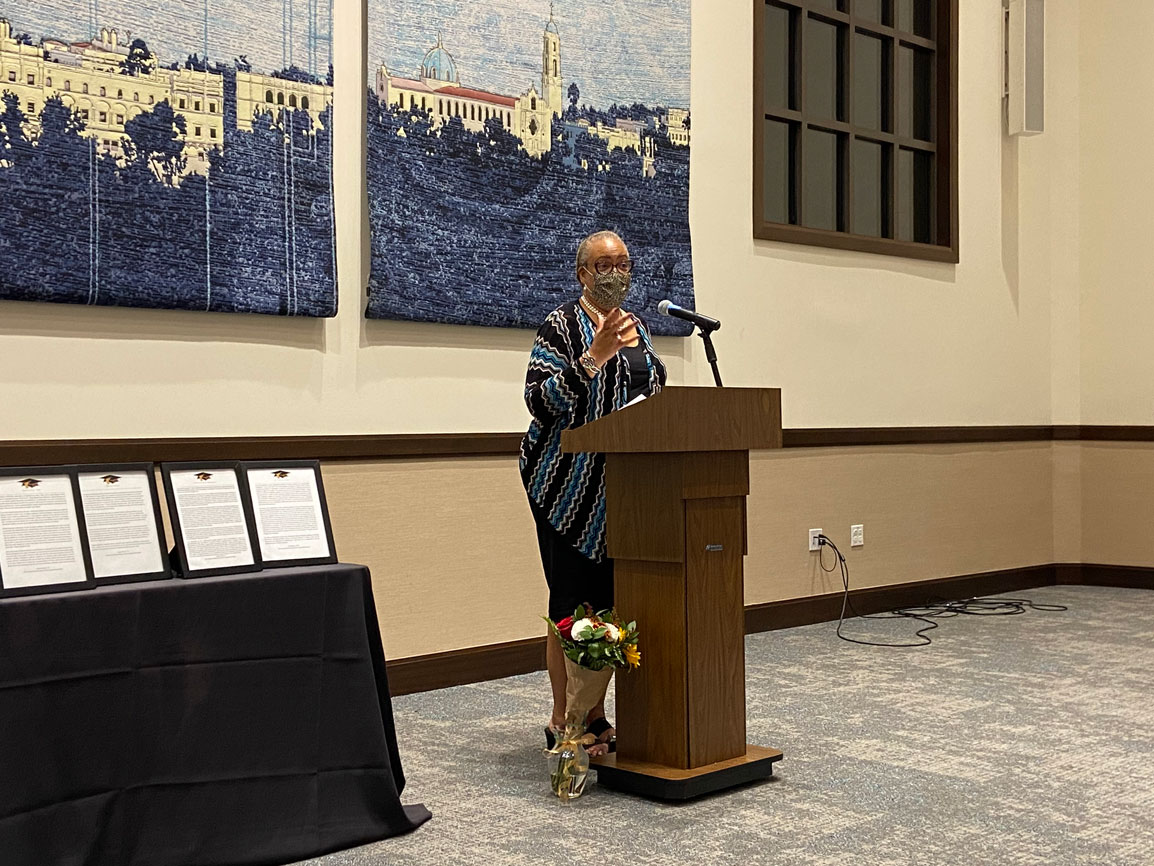 Speaker at the podium of the event
