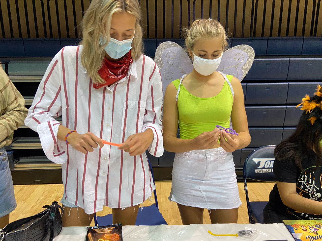 Mortar Board students dressed in costumes making crafts