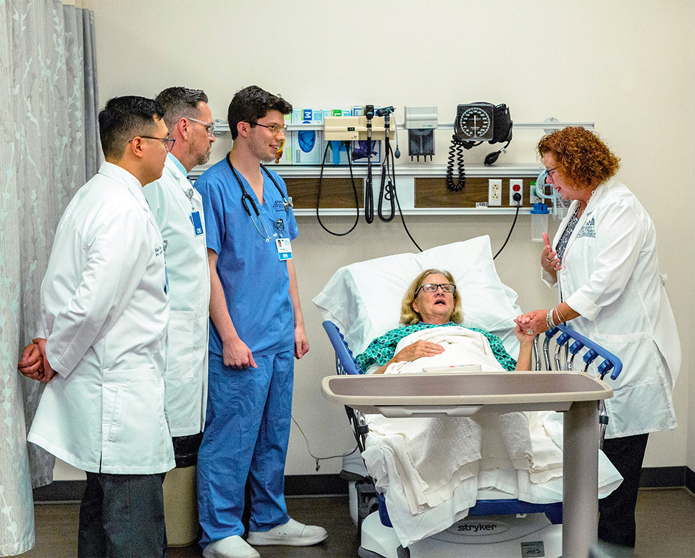 CNS students with faculty in sim lab