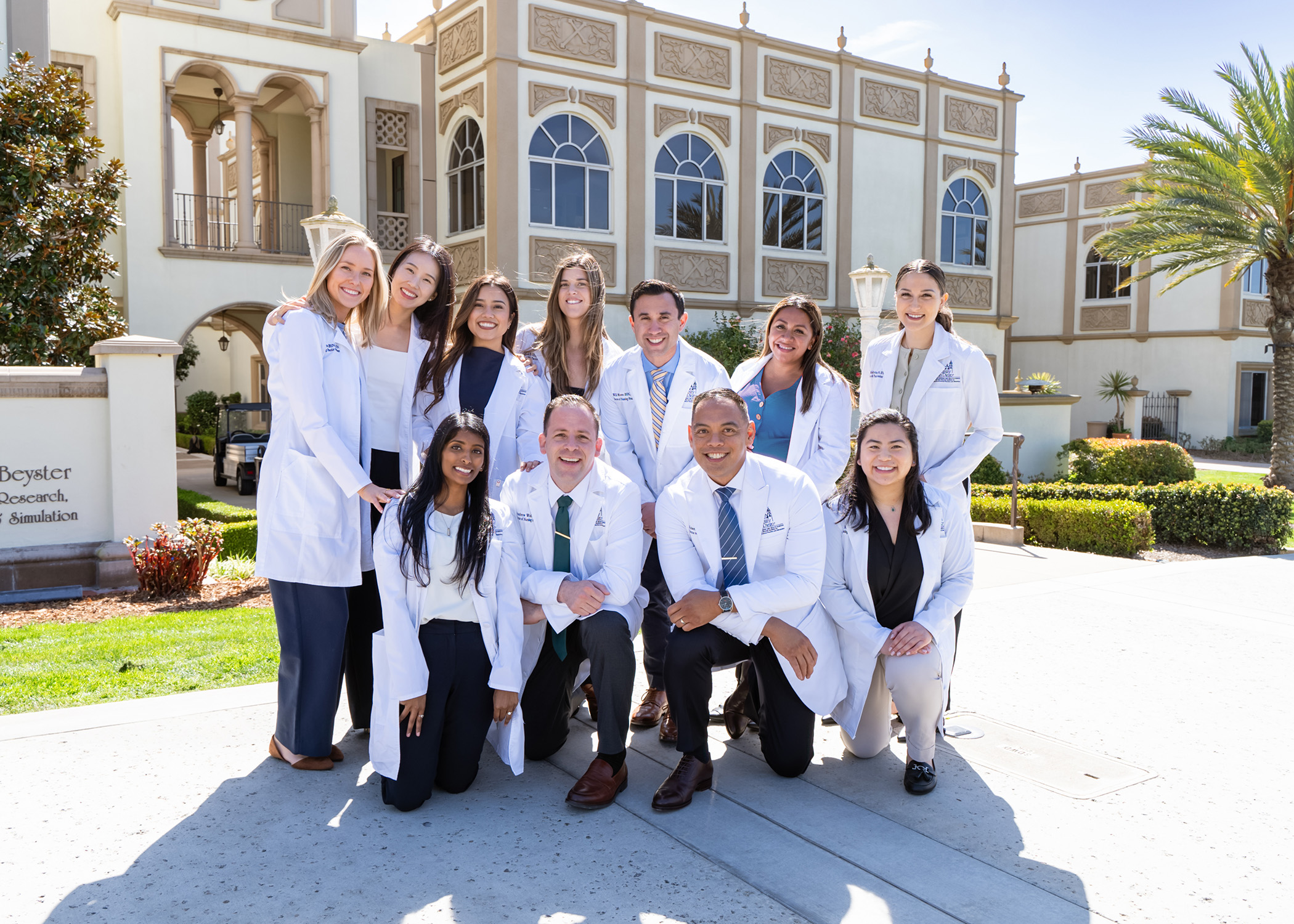 DNP School of Nursing graduates class of 2025 in front of Hahn School of Nursing