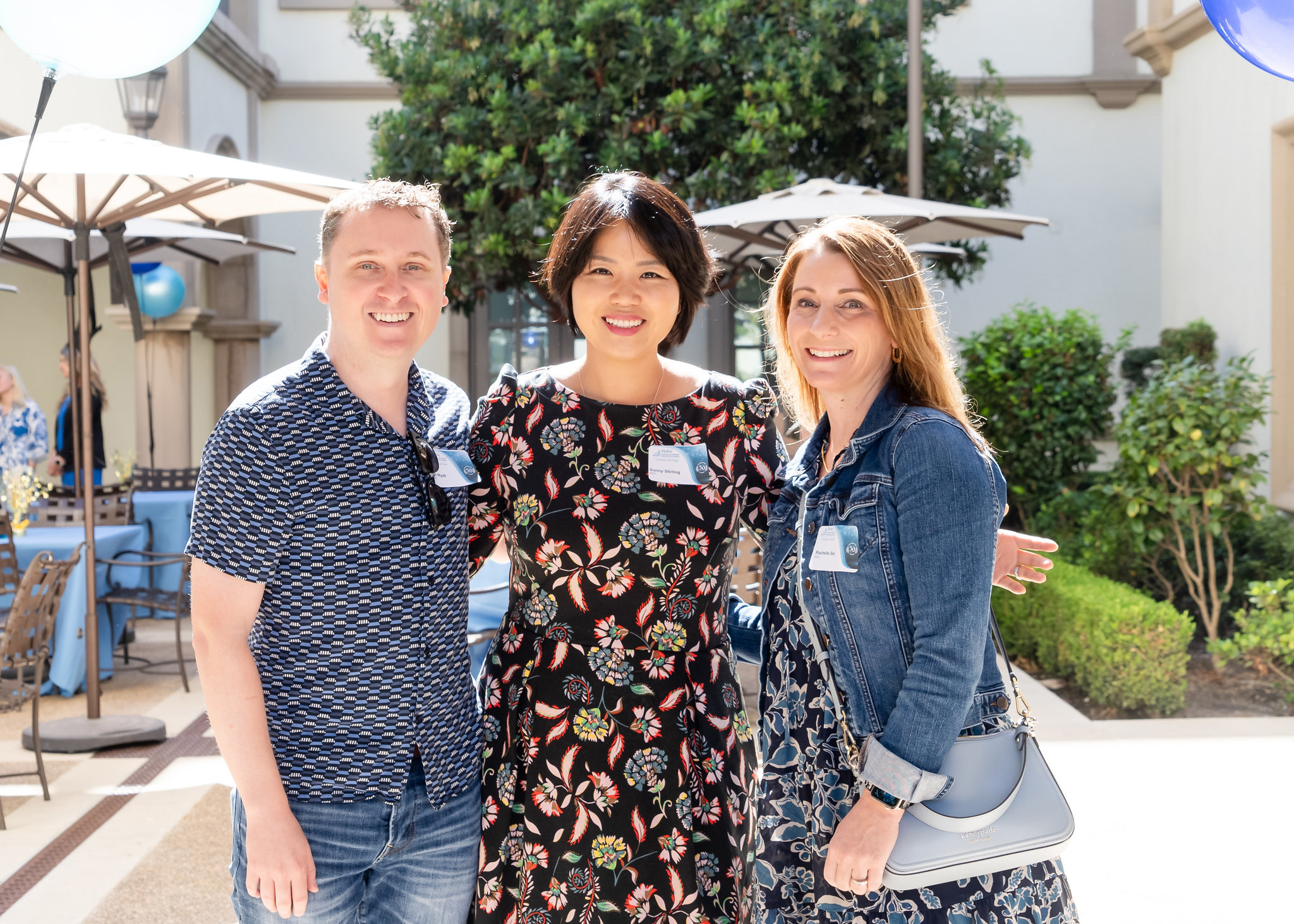 Three nursing alumni attending homecoming luncheon in BINR plaza