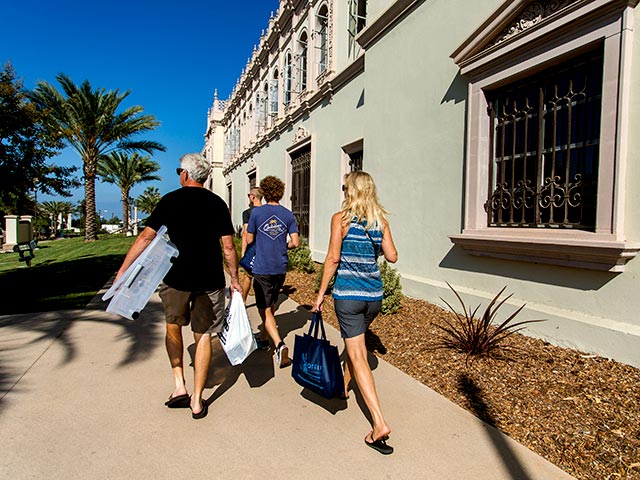 A family moving into the residential halls at USD