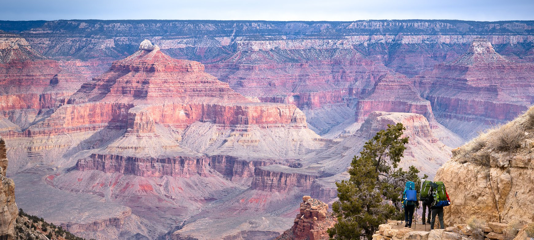 Group hiking through canyon