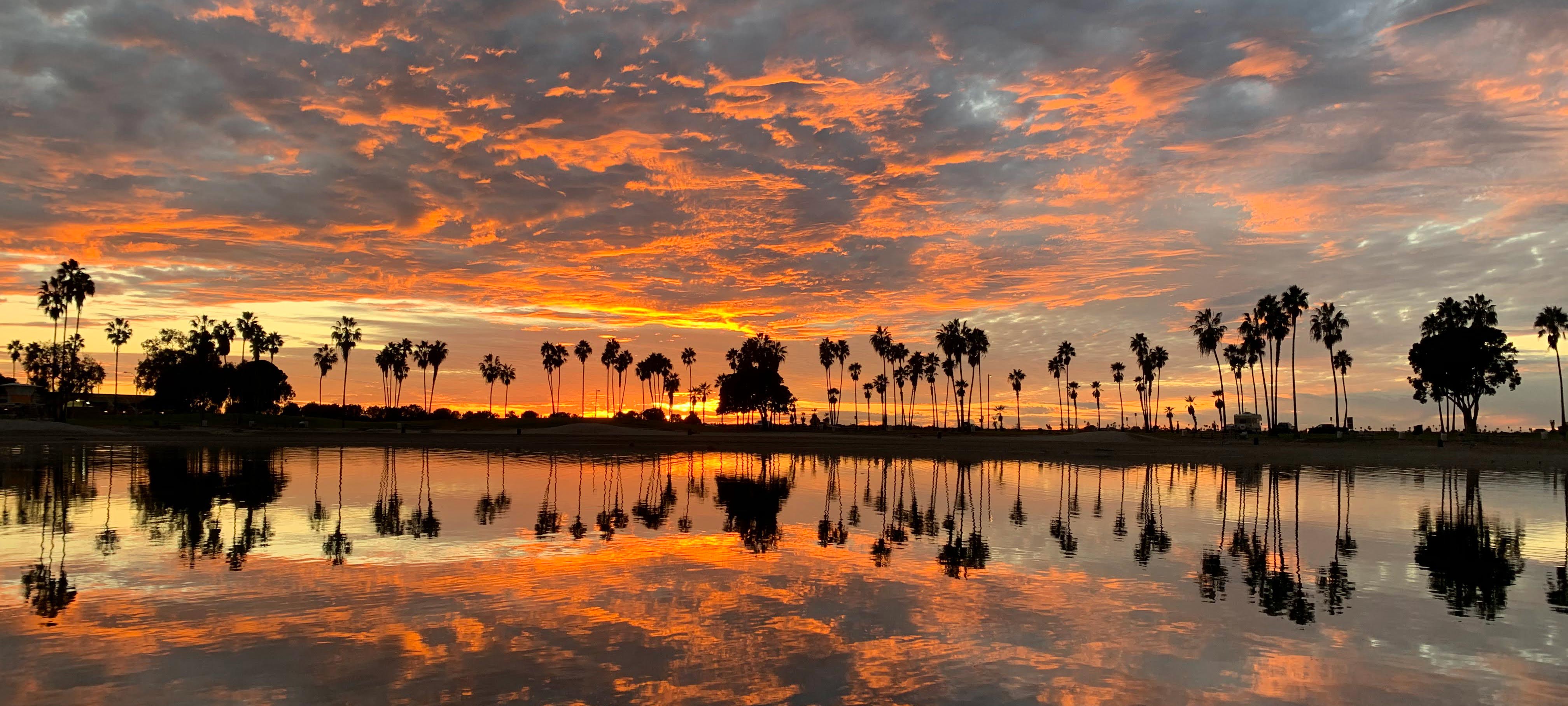 A sunset reflecting across a body of water