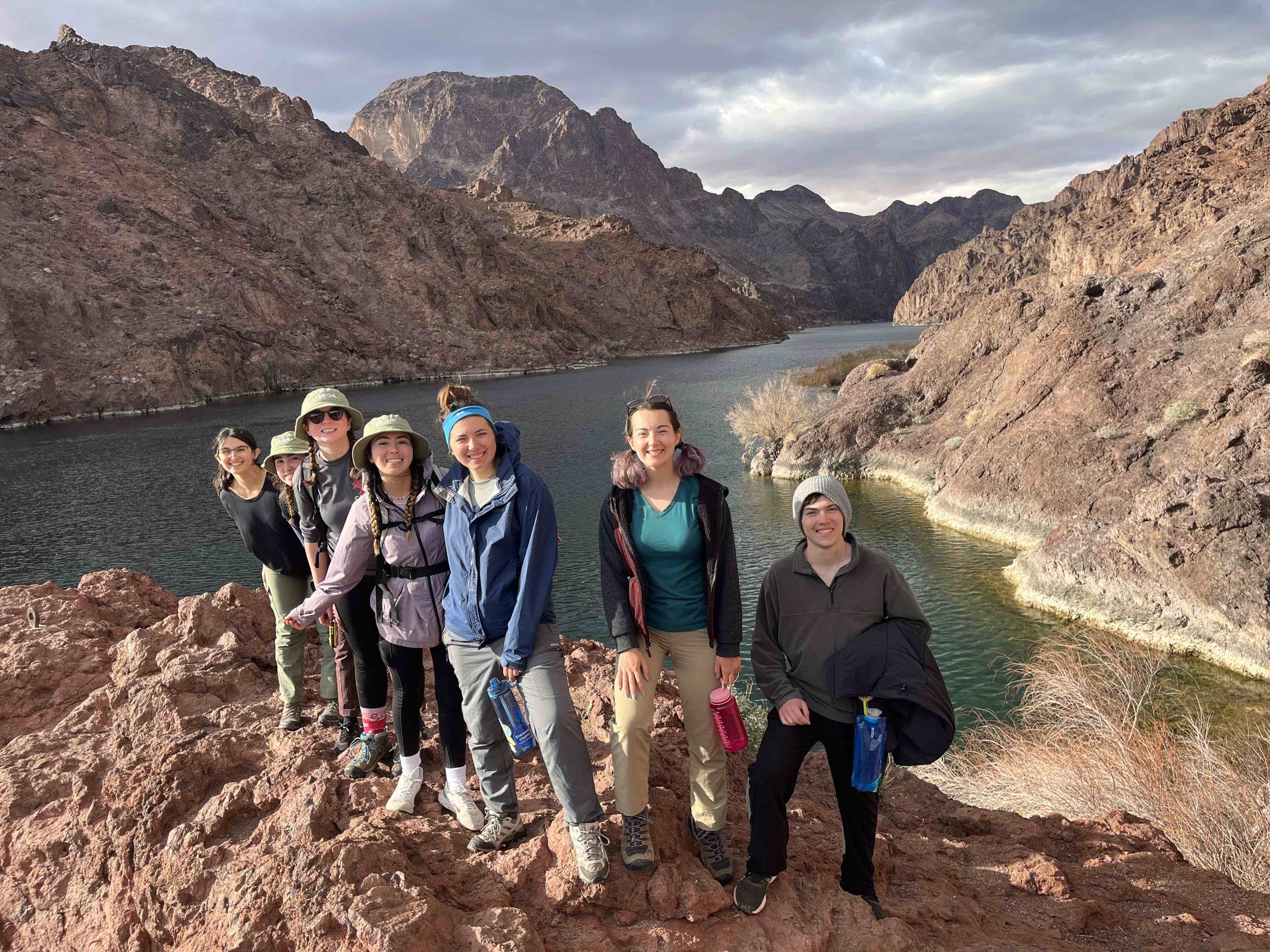 students posing in front of the black canyon river