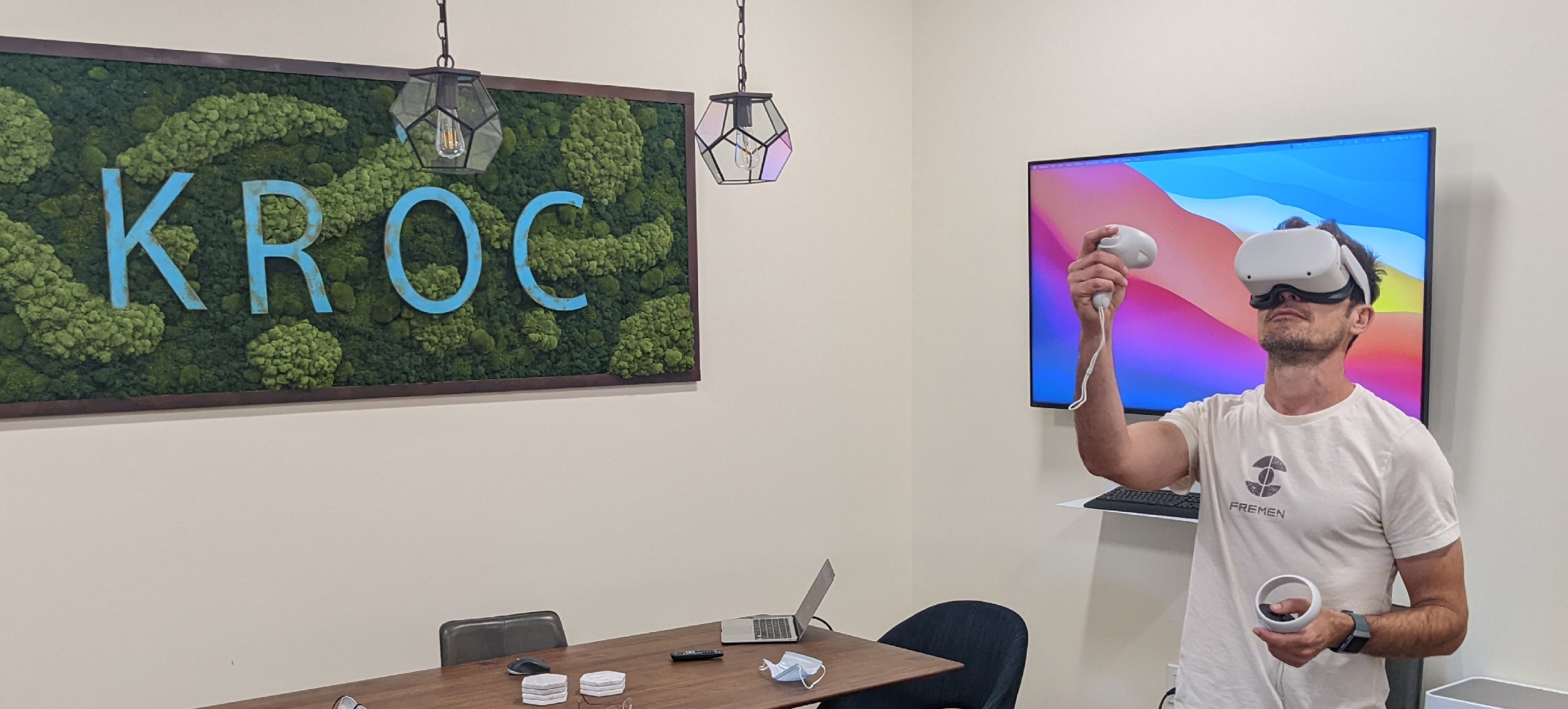 Student using VR setup in a Kroc Peace room area.