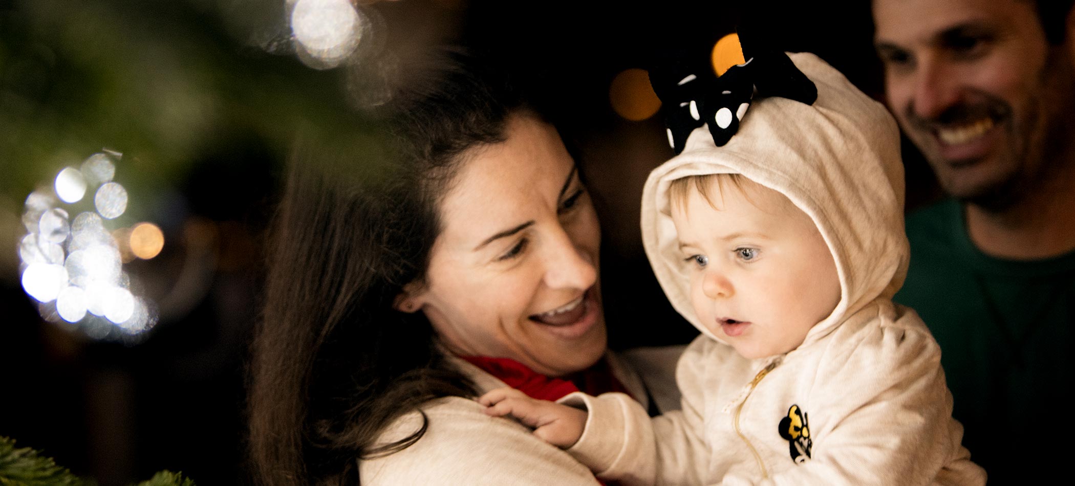 A woman holding a baby