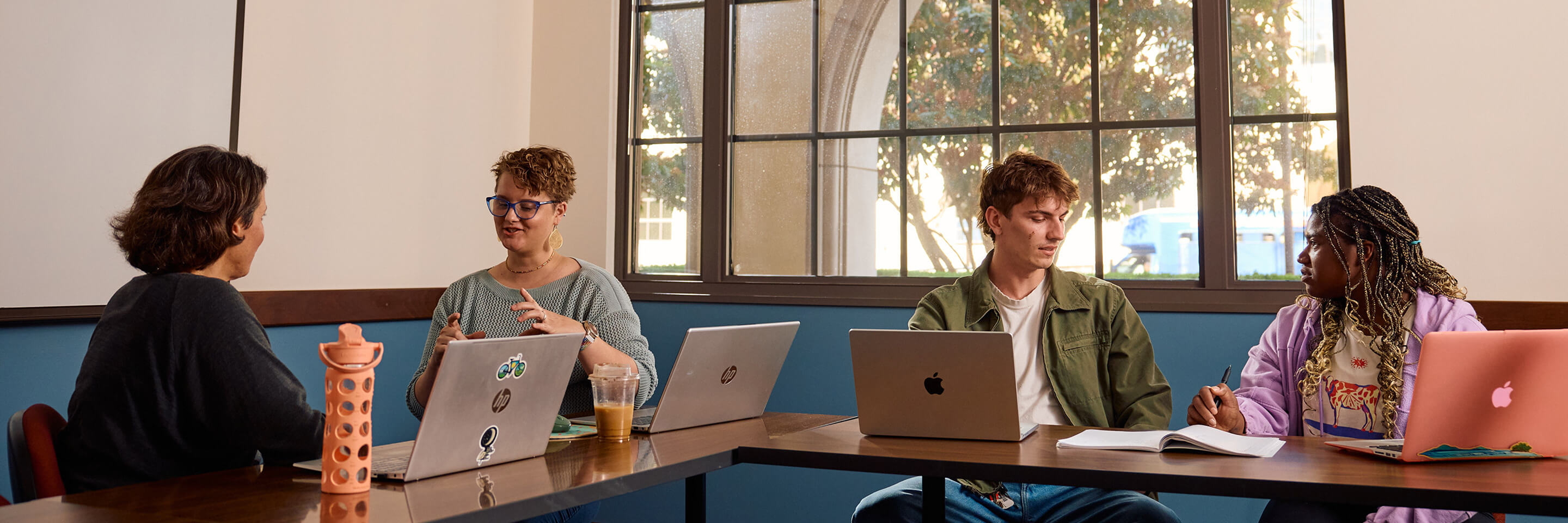students chatting in pairs