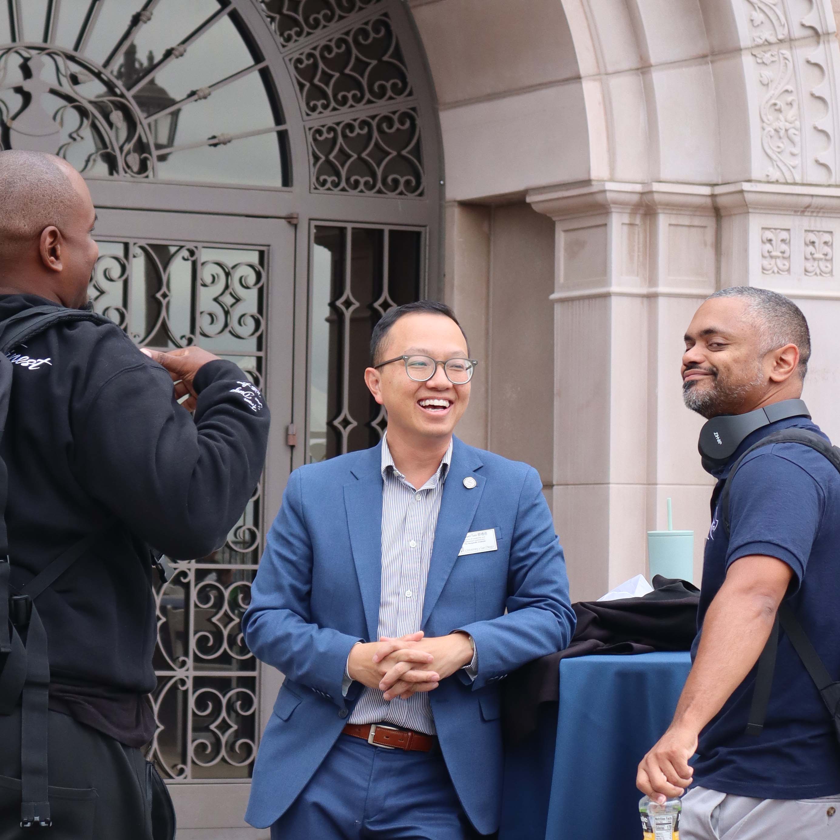 Samuel Tsoi standing in a group at the San Diego Nonprofit Academy