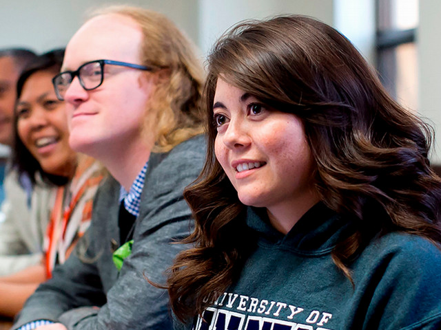 students listening to a speaker