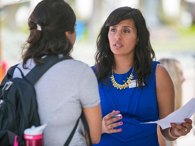 student talking with a counselor