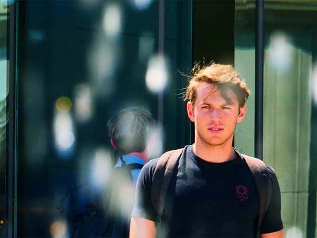 a student walking on campus