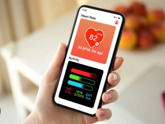 someone holding up a phone with a mobile app loaded