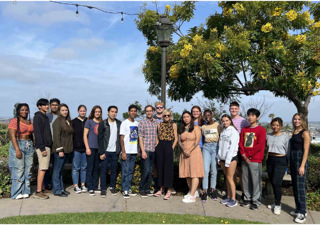 Image of Rae Anderson with members of her lab