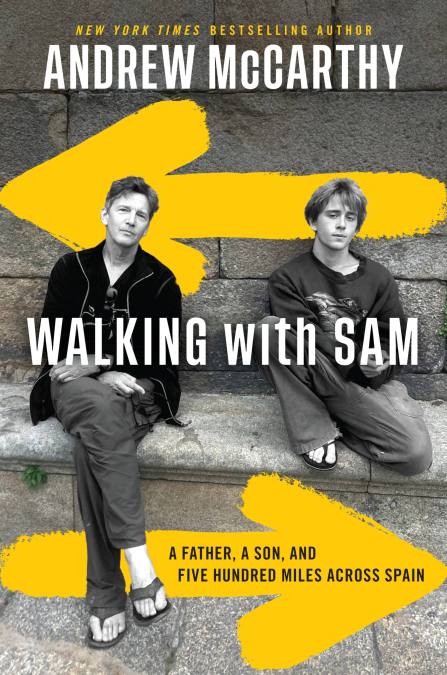 cover of the book, which shows a black and white photo of Andrew and his son sitting  on a stone ledge