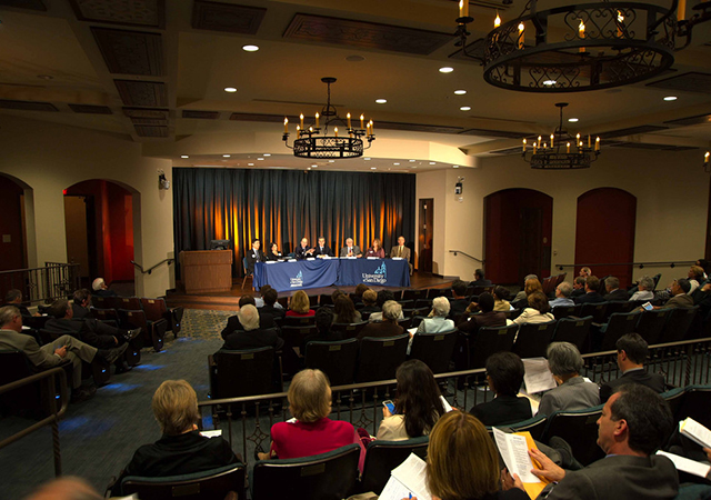 A panel of speakers in Warren Auditorium
