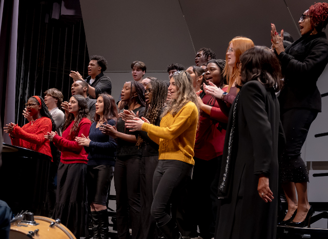 USD Gospel Choir performing on stage in Shiley Theatre in December 2024.