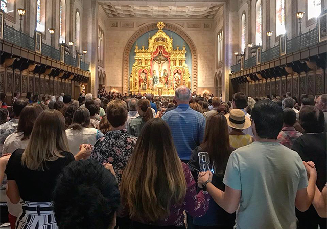 Joining hands in Founders Chapel