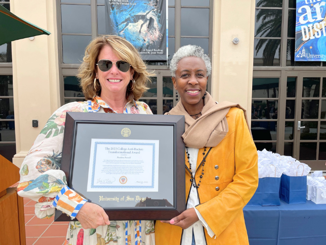 pauline powell standing with noelle norton with award