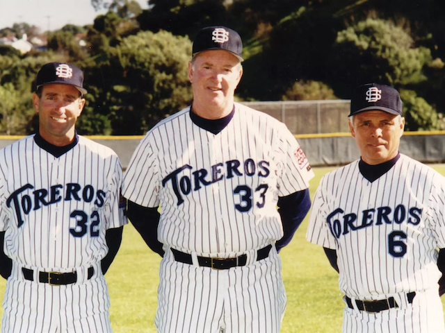 Image of Coach Cunningham and assistant coaches