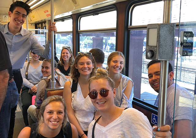 Students in ETLW 403 Environmental Management take the San Diego Metro Trolley during a fall semester field trip.