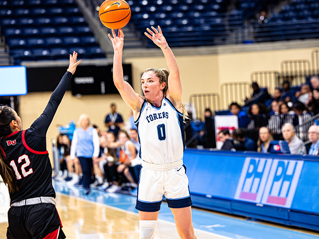 Ava Ranson shooting a basketball