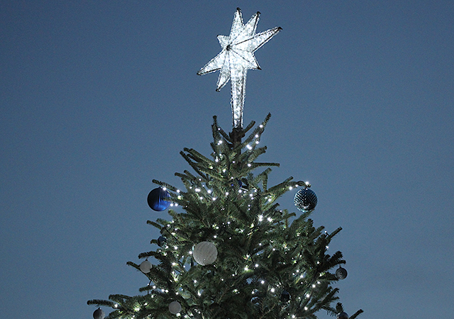 The star on the USD Christmas Tree shines bright during the 2019 lighting ceremony. The 2020 event is virtual on Dec. 1.