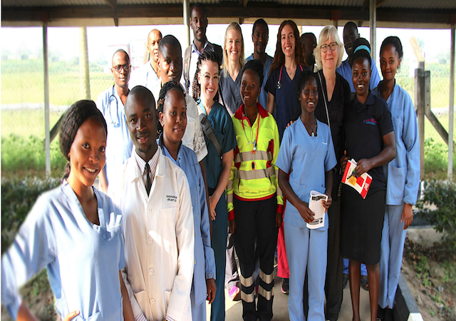 USD faculty members and student, Ugandan medical workers