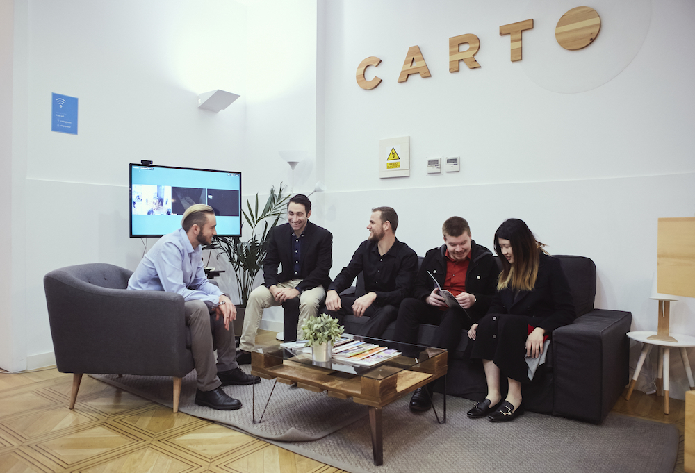 Master’s in business analytics students work together at Carto in Madrid, Spain.