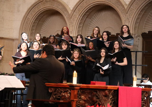 USD Concert Choir singing in Founders Chapel during Lessons and Carols