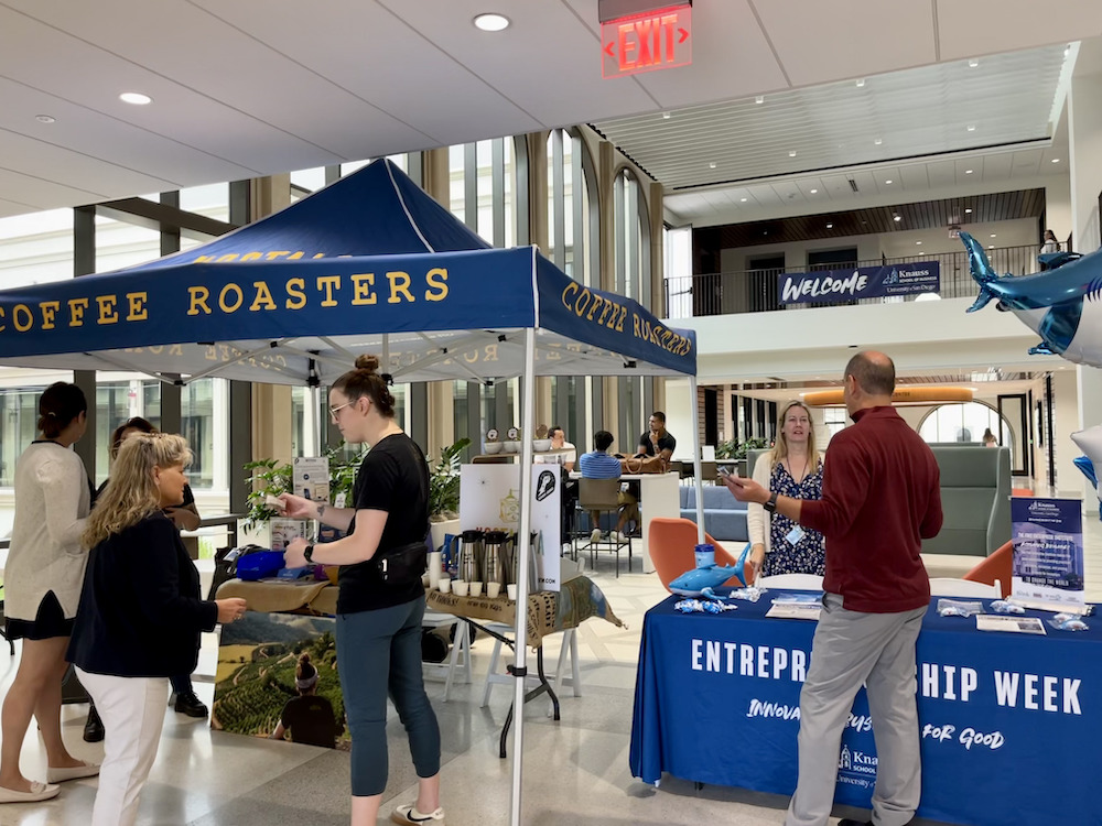 students and staff mingle at Entrepreneurship Week at the University of San Diego