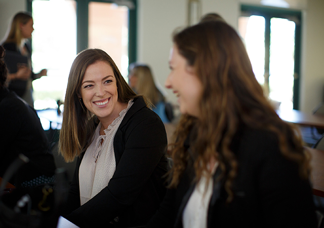 USD students laughing in conversation