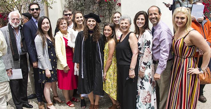 Juliana Mascari, middle, celebrated with her family members at the May 18 USD School of Law graduation. Mascari is a double alumna of USD, having received her BA in English in 2016.