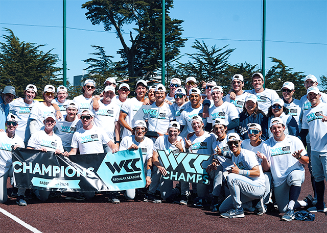 Baseball poses with the WCC banner