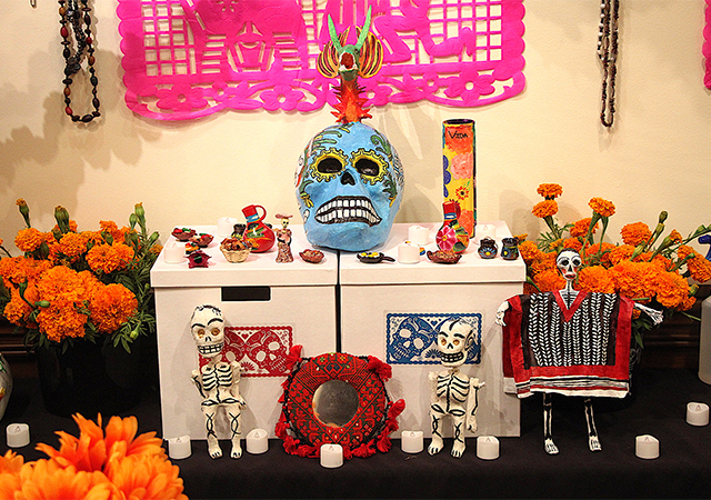 A close-up view of one level of the altar that is on display in the Hahn University Center Exhibit Hall (across from Torero Store) this week in recognition of Dia de los Muertos.