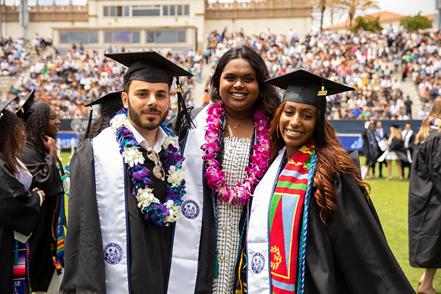 Graduates pose for a photo
