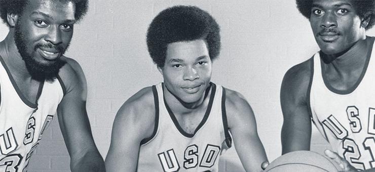 Stan Washington with USD Men's Basketball teammates