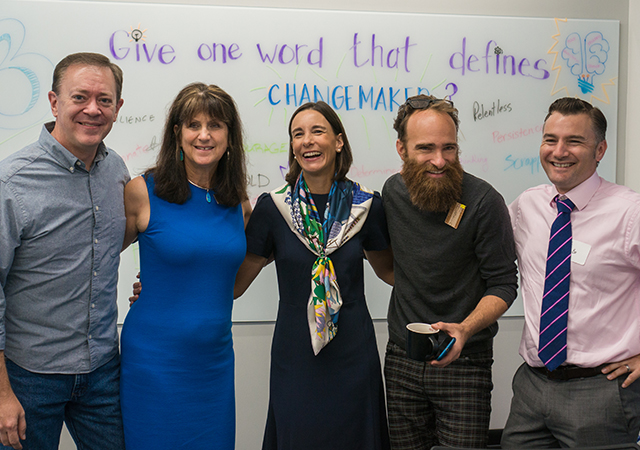 Kroc School Professors Karen Henken, second from left, and Austin Choi-Fitzpatrick, second from right, are teaching in the social innovation master's program.