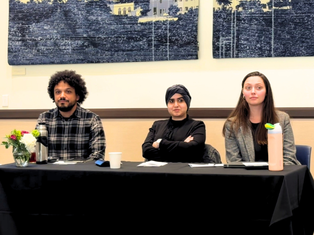 3 speakers sitting down at the Cluster-Theme Symposium IV