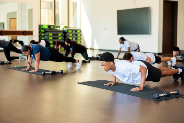 students participating in group fitness classes