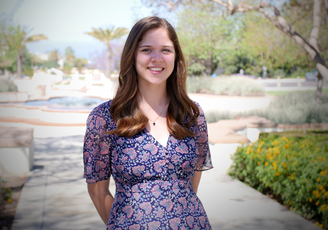 Amy Bainton, recent College of Arts and Science graduate, in Colachis Plaza