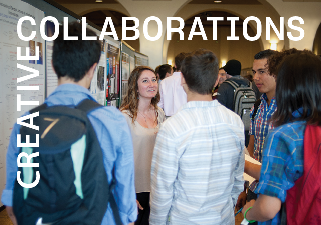 Female student presenting her poster to 4 male students