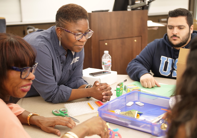 Odesma Dalrymple, Phd with students from USD's Shiley-Marcos School of Engineering and the SD Blind Community Center.