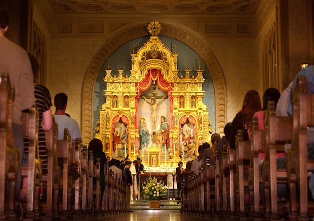 image of mass being celebrated in founders hall