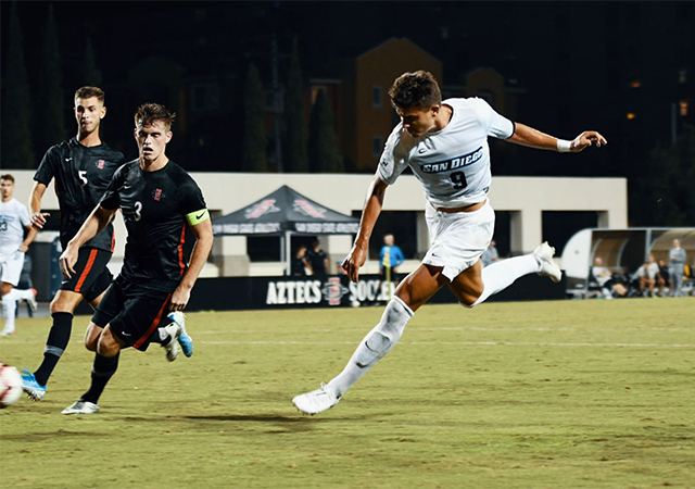 Senior forward Miguel Berry advances the ball against San Diego State.